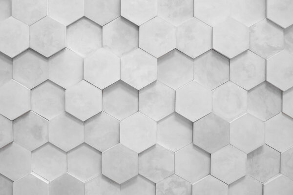 Hexagones blancs sur un mur Hexagones blancs sur un mur