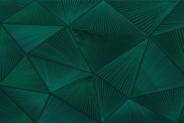 Motif triangulaire vert sur une surface verte Motif triangulaire vert sur une surface verte