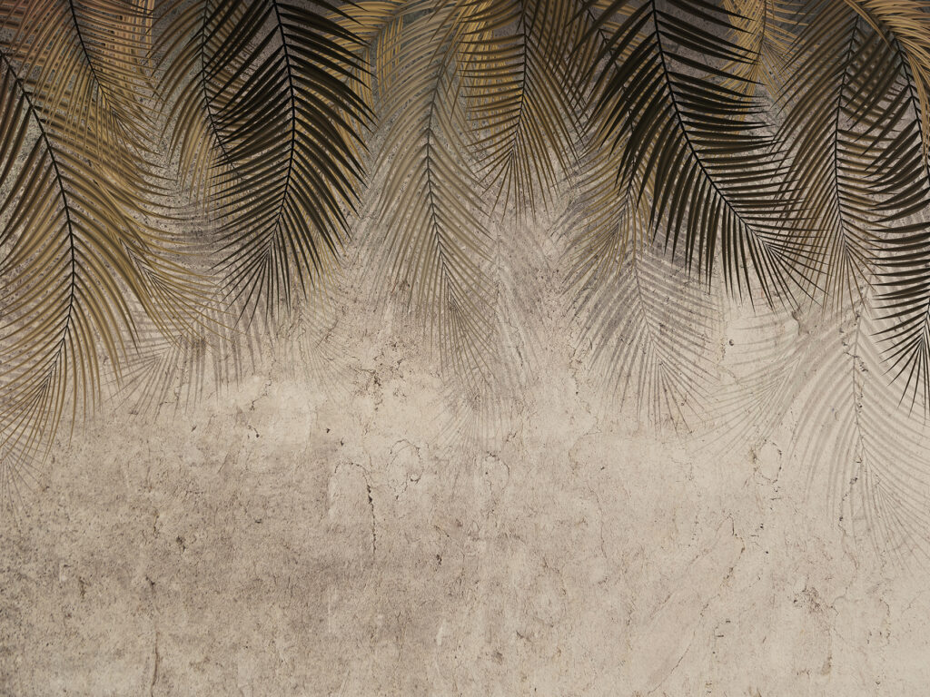 Feuilles de palmier sur fond texturé Feuilles de palmier sur fond texturé