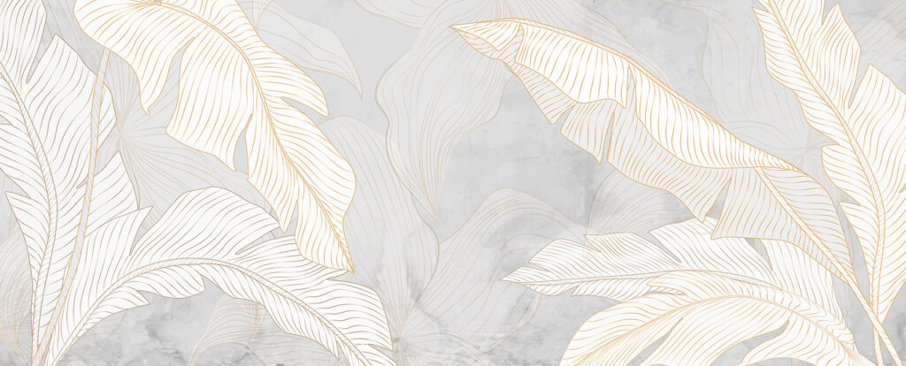 A white and orange leaves on a gray background