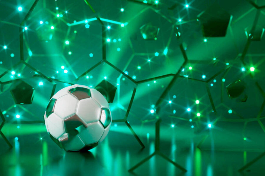 Ballon de football sur une surface réfléchissante Ballon de football sur une surface réfléchissante
