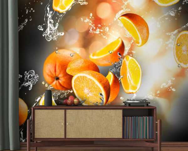 Oranges tombant dans l'eau avec éclaboussures Oranges tombant dans l'eau avec éclaboussures