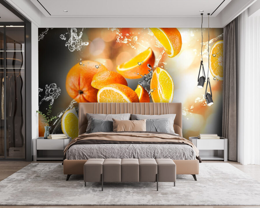 Oranges tombant dans l'eau avec éclaboussures