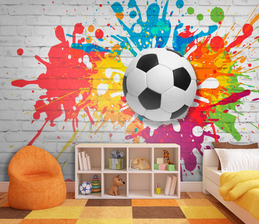 Ballon de football sur un mur de briques