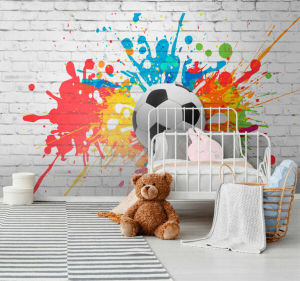 Ballon de football sur un mur de briques Ballon de football sur un mur de briques