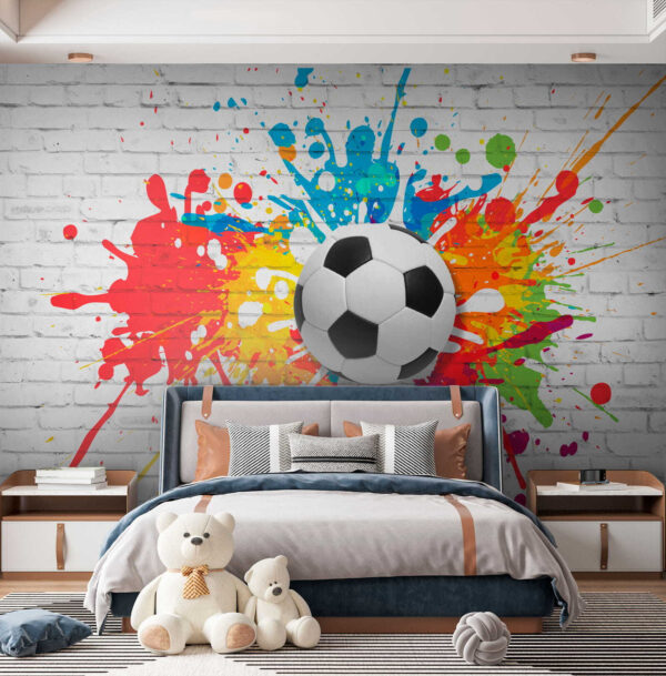 Ballon de football sur un mur de briques Ballon de football sur un mur de briques