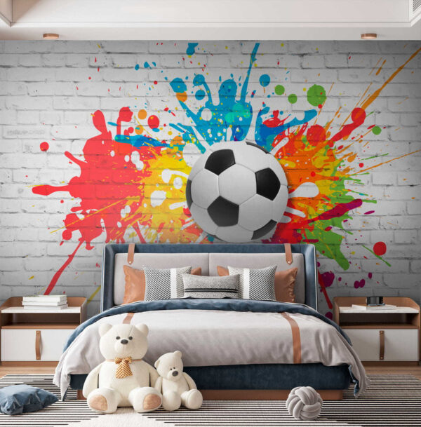 Ballon de football sur un mur de briques