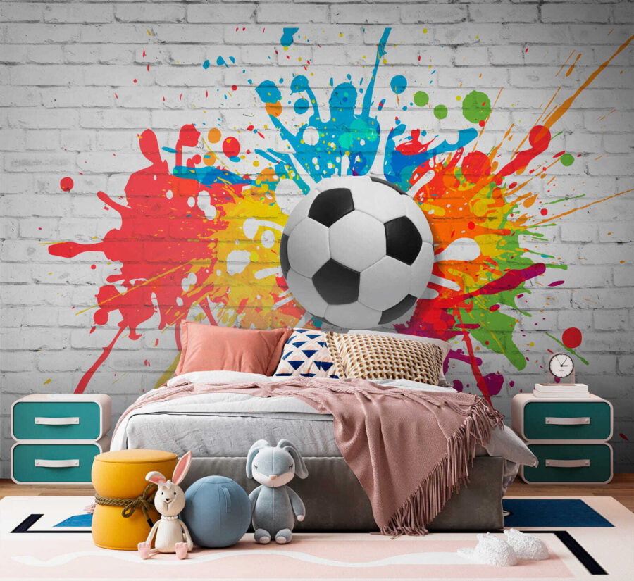 Ballon de football sur un mur de briques