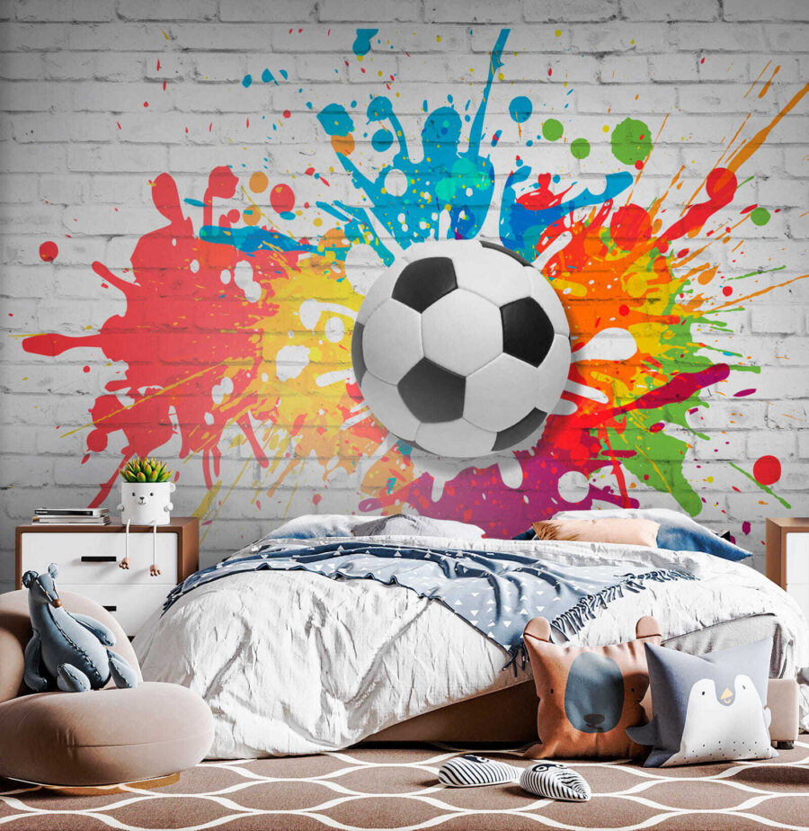 Ballon de football sur un mur de briques