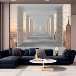 Papier peint Longue allée avec des piliers et une ville en arrière-plan