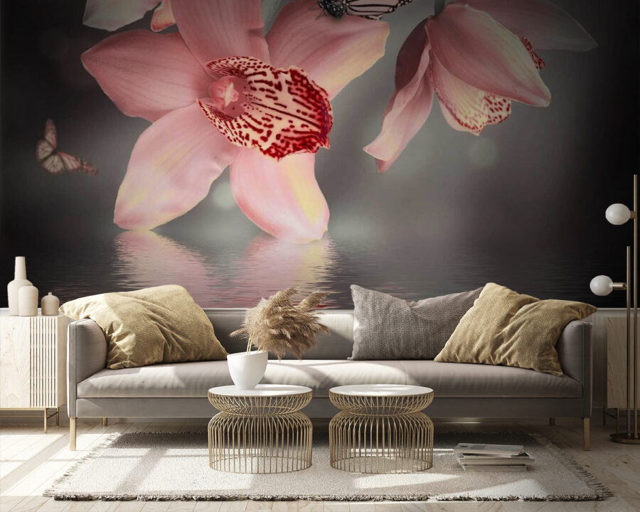 Orchidées roses et papillons sur une branche Orchidées roses et papillons sur une branche