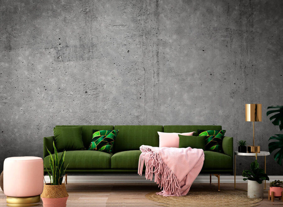 Mur de béton gris avec des taches noires