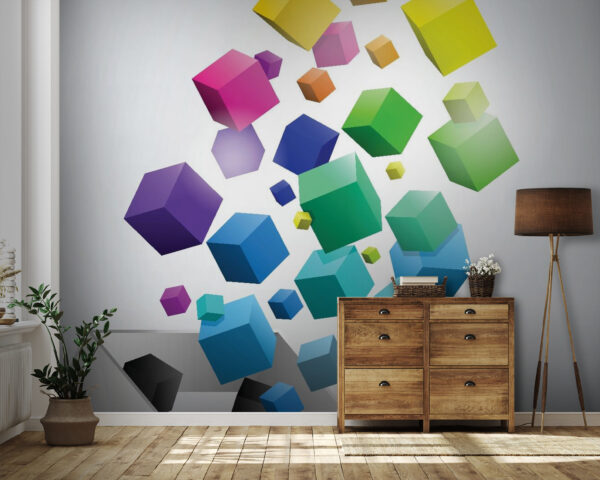 Cubes colorés tombant dans une boîte