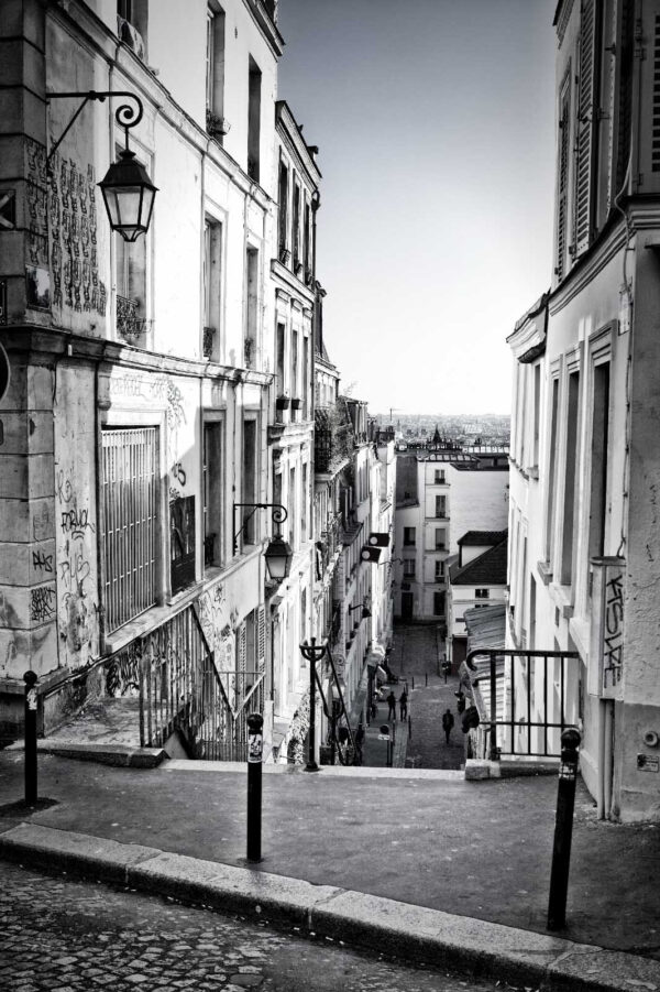 Rue avec des bâtiments et un lampadaire Rue avec des bâtiments et un lampadaire