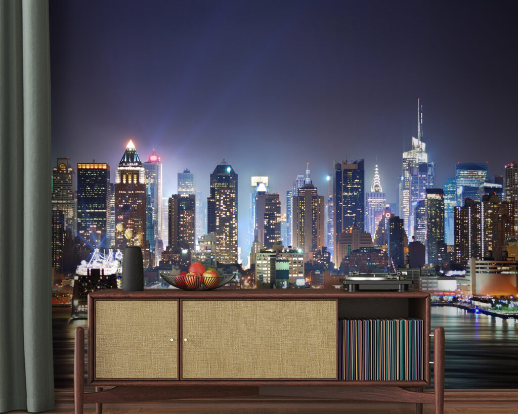 City skyline at night with lights reflecting on water City skyline at night with lights reflecting on water