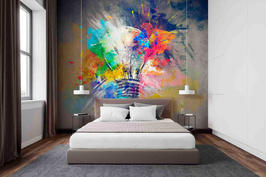 Light bulb with colorful paint splatters Light bulb with colorful paint splatters