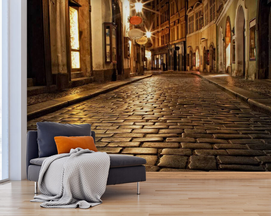 Rue en pierre avec bâtiments et lampadaires