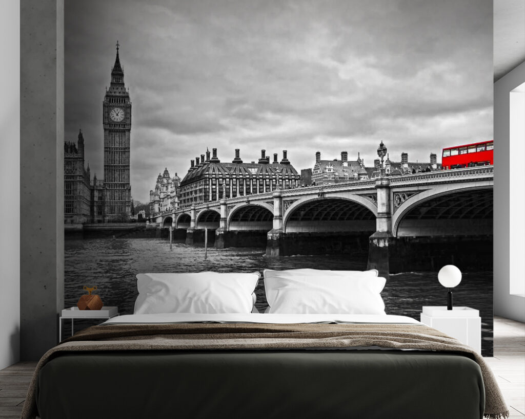 Bridge over water with a clock tower and a red bus Bridge over water with a clock tower and a red bus