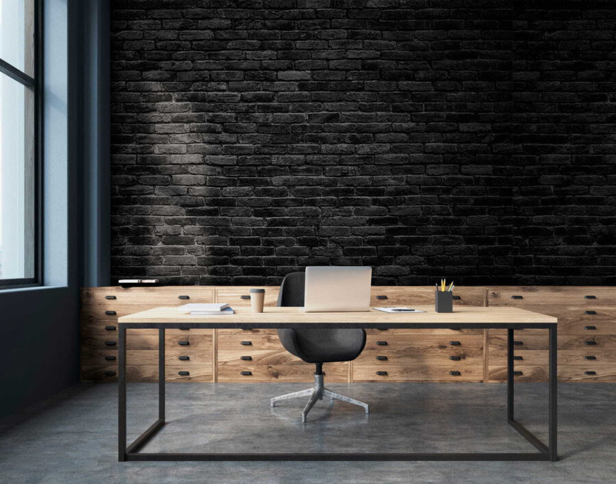 Mur de briques noires avec un point blanc