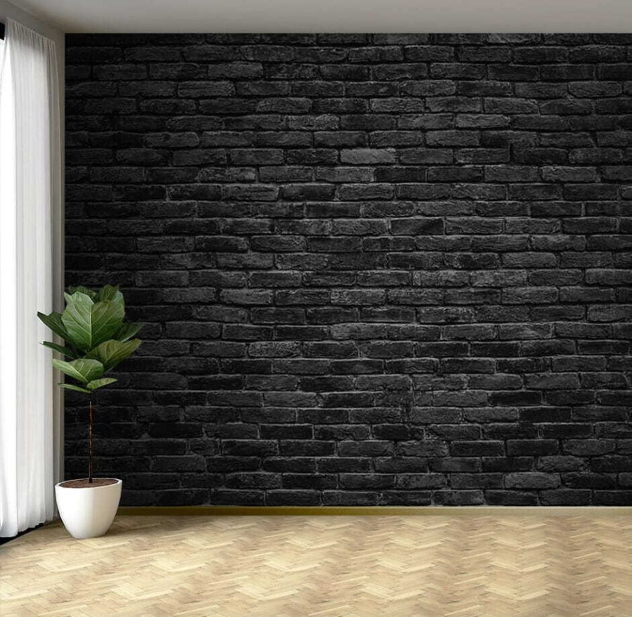 Mur de briques noires avec un point blanc