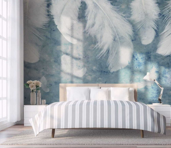 Plumes blanches sur une surface bleue Plumes blanches sur une surface bleue