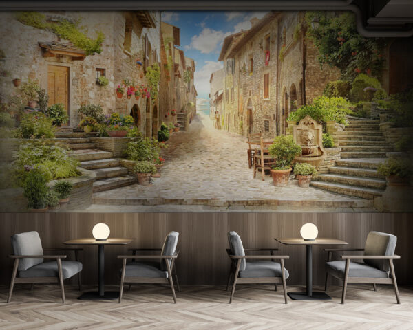 Rue en pierre avec des bâtiments en pierre et des plantes Rue en pierre avec des bâtiments en pierre et des plantes
