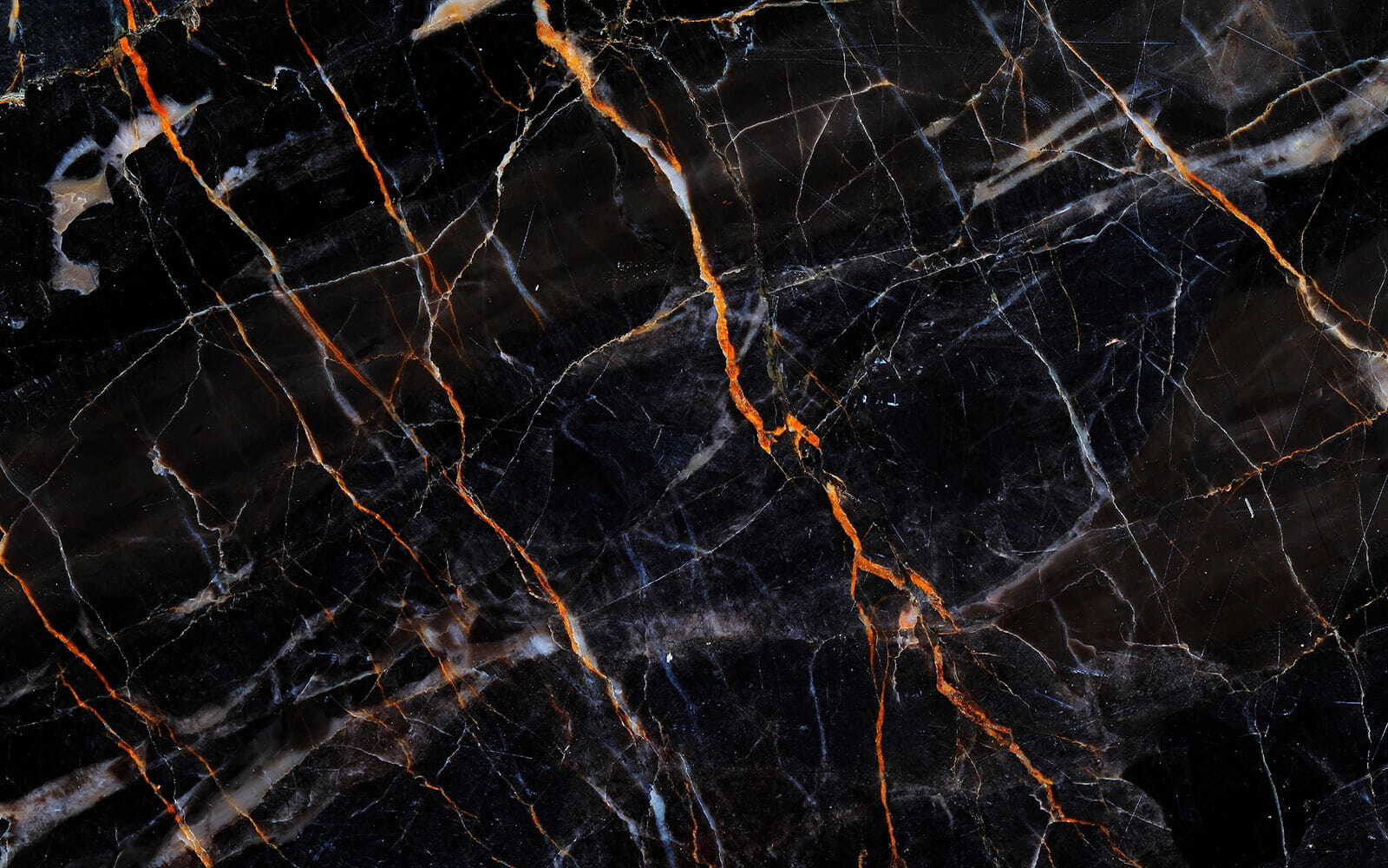 Black marble with fiery orange veins Black marble with fiery orange veins