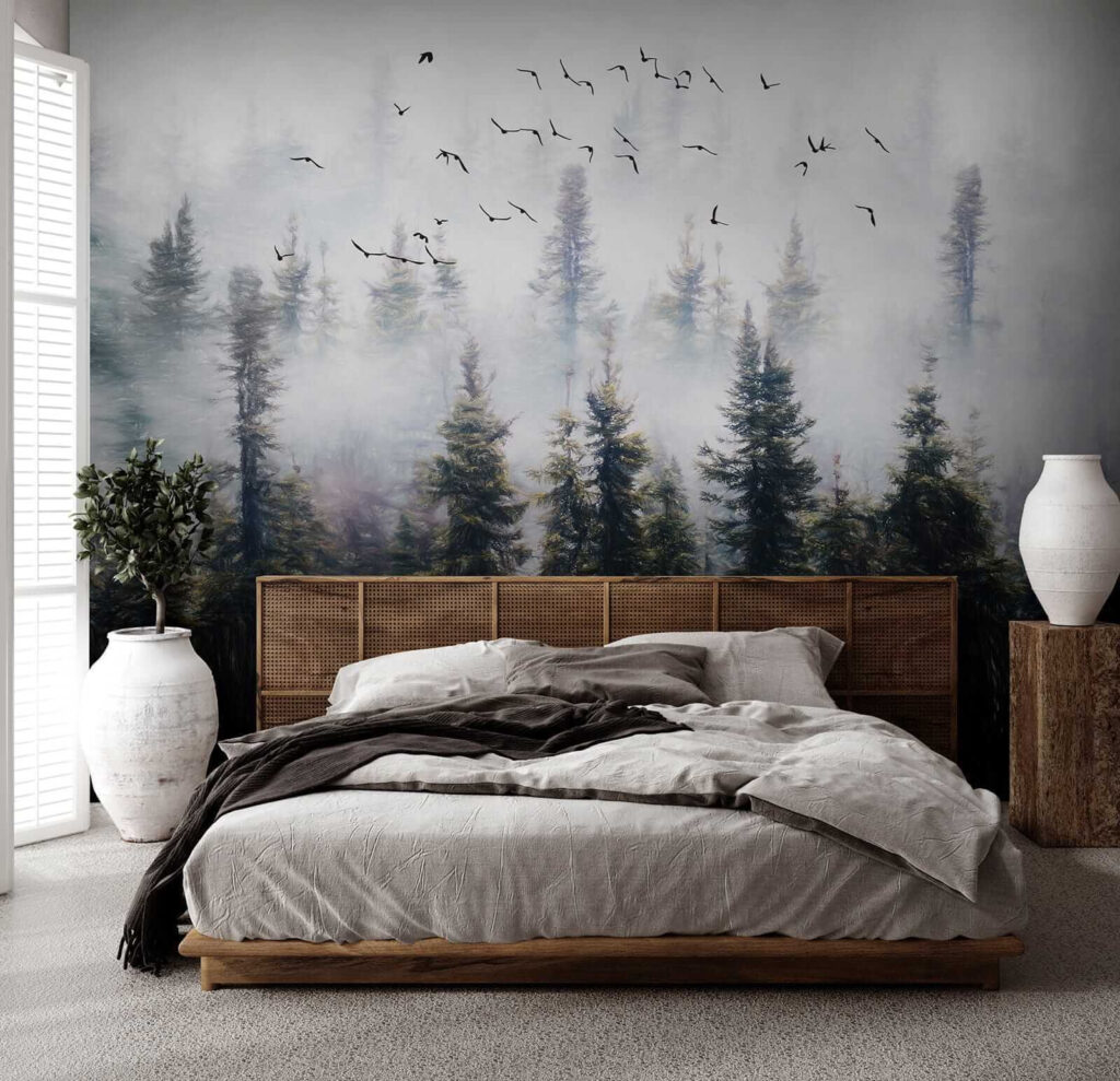 Birds flying in the sky over trees