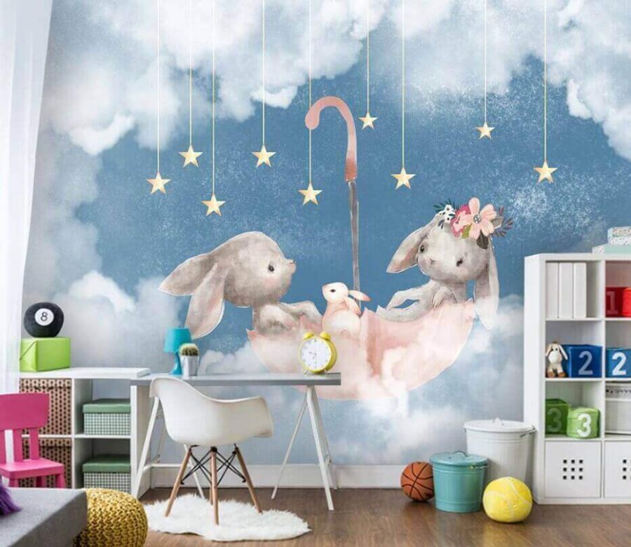 Deux lapins dans un parapluie rose