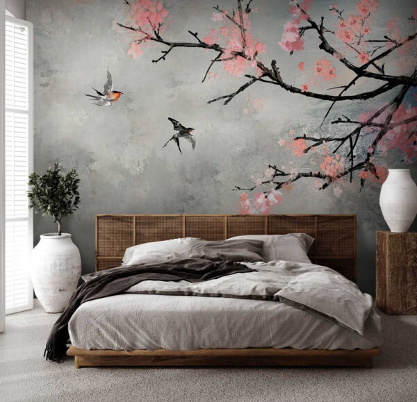 Branche d'arbre avec fleurs roses et oiseaux en vol Branche d'arbre avec fleurs roses et oiseaux en vol