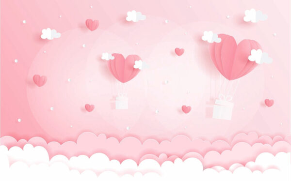 Découpage en papier rose de montgolfières et de nuages Découpage en papier rose de montgolfières et de nuages