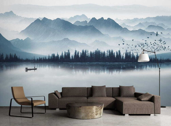 Personne dans un bateau sur un lac avec des montagnes en arrière-plan Personne dans un bateau sur un lac avec des montagnes en arrière-plan