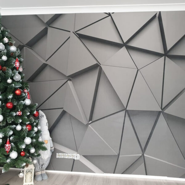 Motif triangulaire noir sur une surface Motif triangulaire noir sur une surface