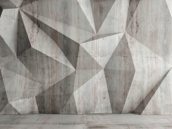 Un mur en béton avec un motif triangulaire Un mur en béton avec un motif triangulaire