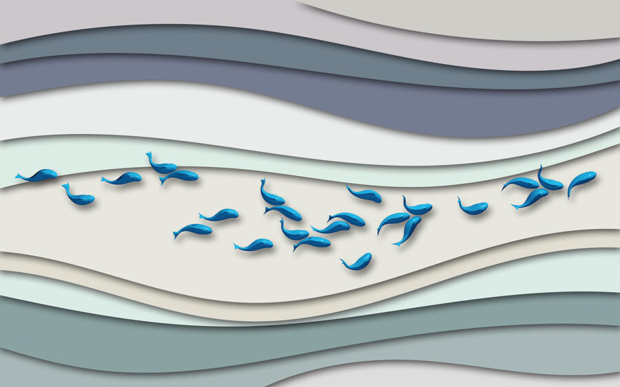 Groupe de poissons bleus nageant dans un groupe de vagues