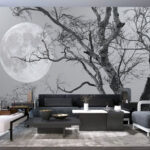 Papier peint Arbre avec des branches et une lune en arrière-plan