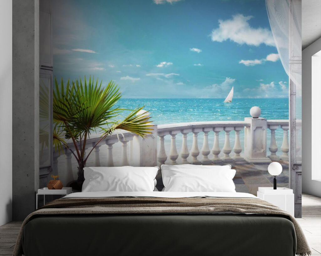 Balcony with a palm tree and a sailboat in the water Balcony with a palm tree and a sailboat in the water