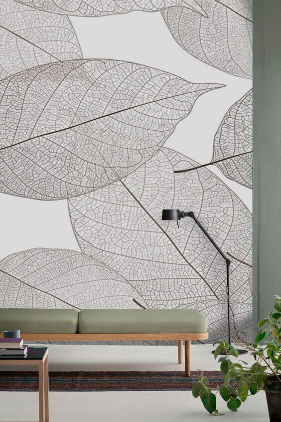 Motifs de feuilles délicats dans l'espace blanc