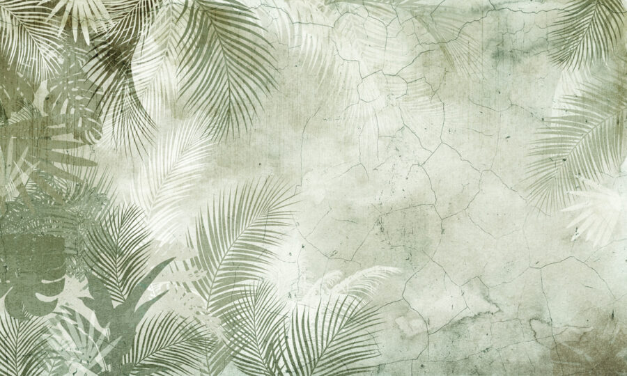 Un mur avec des feuilles de palmier