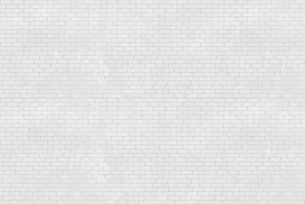 Mur de briques blanches avec de nombreuses petites briques Mur de briques blanches avec de nombreuses petites briques