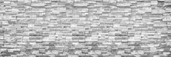 Textured stone wall in monochrome design Textured stone wall in monochrome design