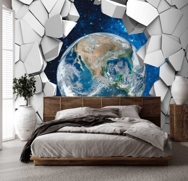 La planète Terre passe à travers un trou dans le mur La planète Terre passe à travers un trou dans le mur