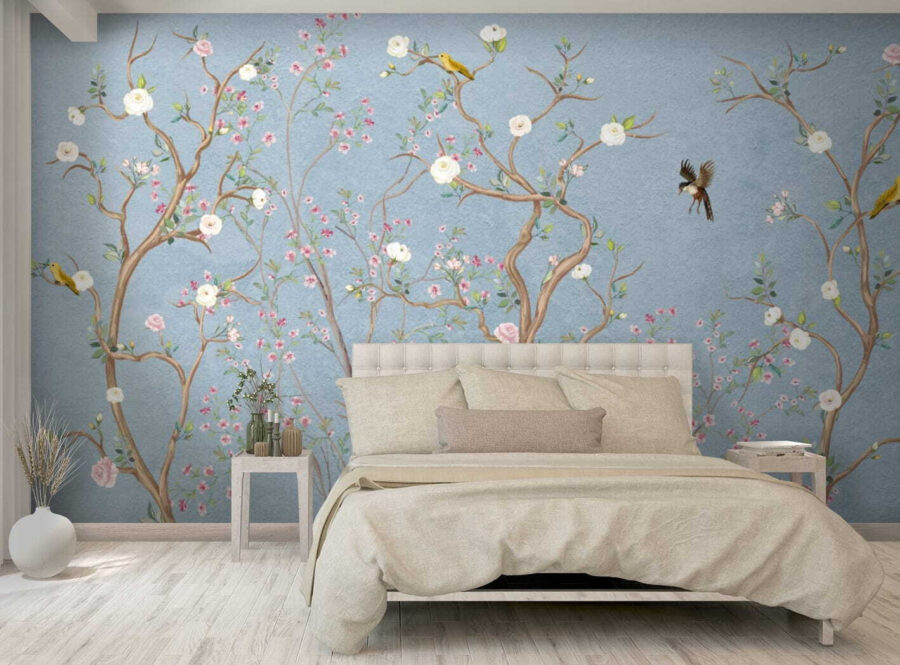 Peinture murale d'un arbre avec des fleurs et des oiseaux