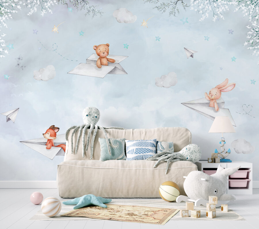 Un avion en papier et des ours en peluche
