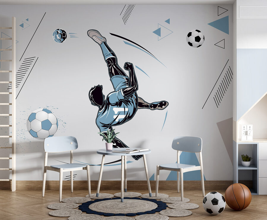 Un joueur de football bottant un ballon
