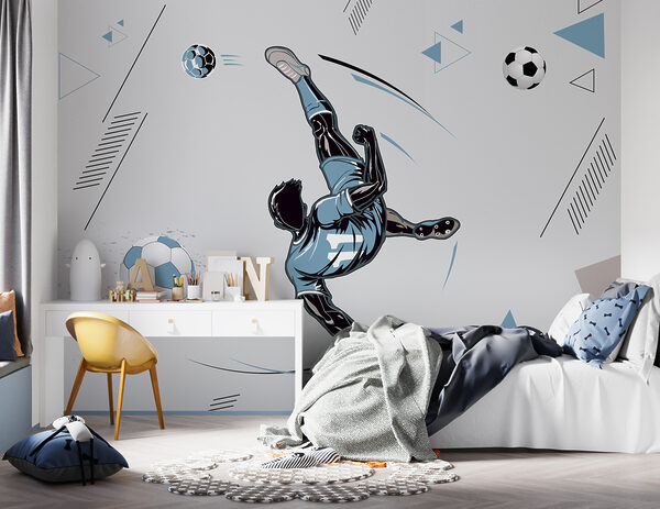 Un joueur de football bottant un ballon Un joueur de football bottant un ballon