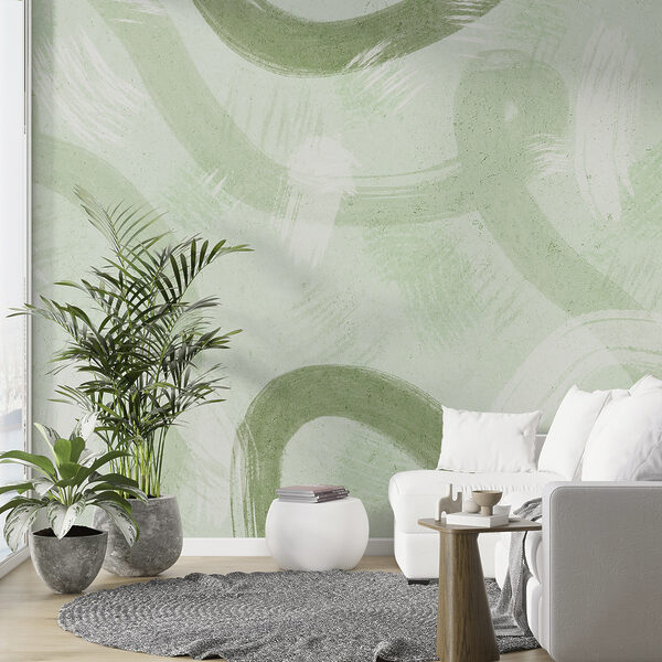 A white surface with green paint strokes