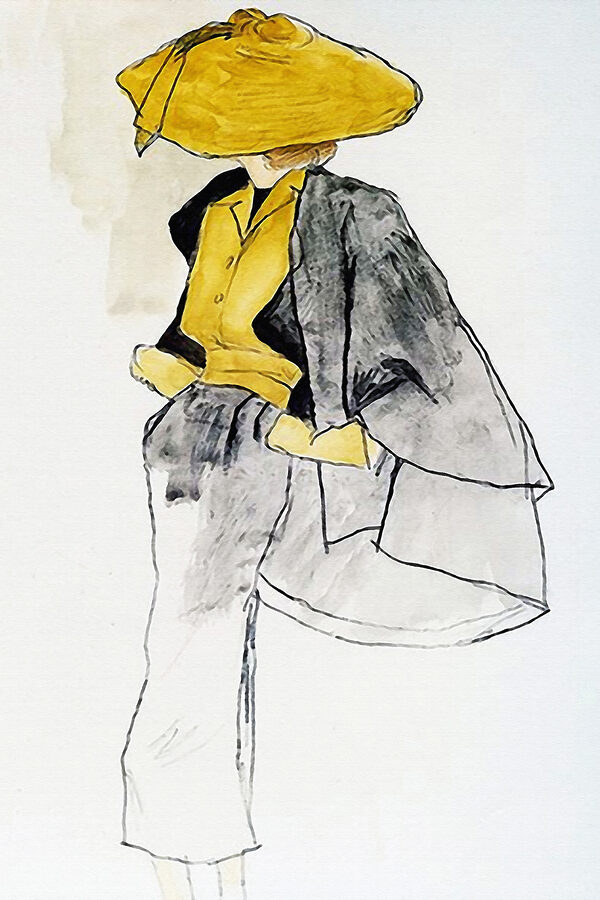 A woman wearing a yellow shirt and grey pants