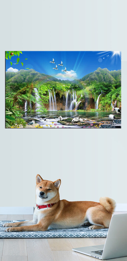 A waterfall with birds flying over it