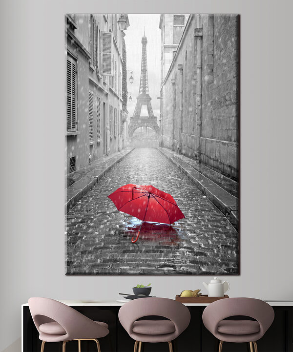 Un parapluie rouge dans une rue avec une tour en arrière-plan Un parapluie rouge dans une rue avec une tour en arrière-plan